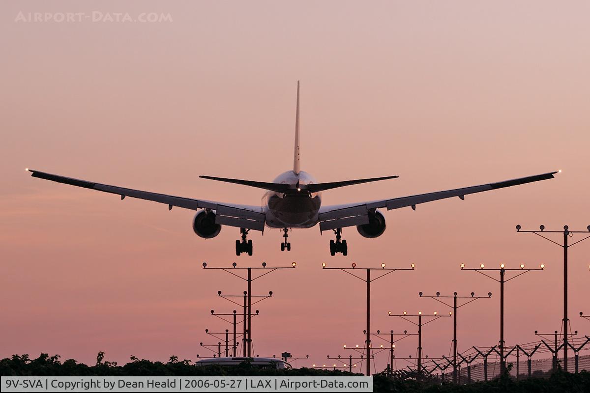 9V-SVA, 2001 Boeing 777-212/ER C/N 28524, Singapore Airlines 9V-SVA (FLT SIA30) from Chiang Kai Shek Int'l (RCTP) seconds from touchdown on RWY 24R.