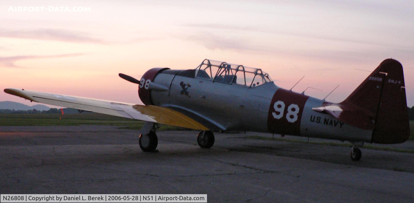 N26808, 1956 North American SNJ-4 Texan C/N 88-11452, This immaculate SNJ-4 takes in the last rays of a spring day.