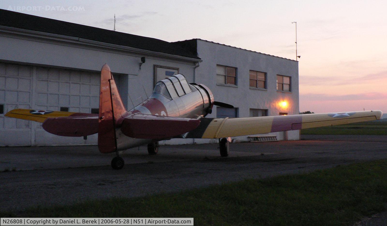N26808, 1956 North American SNJ-4 Texan C/N 88-11452, Beautiful 1956 SNJ-4 glistens in a glorious spring sunset at Solberg Airport.