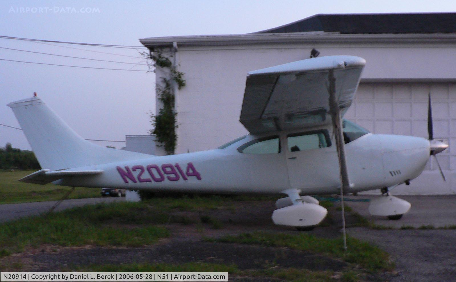 N20914, 1972 Cessna 182P Skylane C/N 18261294, All-white Cessna 182P takes on the blue tint of an evening sky.