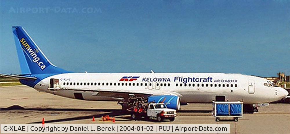 G-XLAE, 2001 Boeing 737-8Q8 C/N 30637, The aircraft is pictured here on lease to Kelowna Flightcraft Air Charter, operating a flight to Punta Cana, Dominican Republic. on behalf of Sun Wing Vacations.