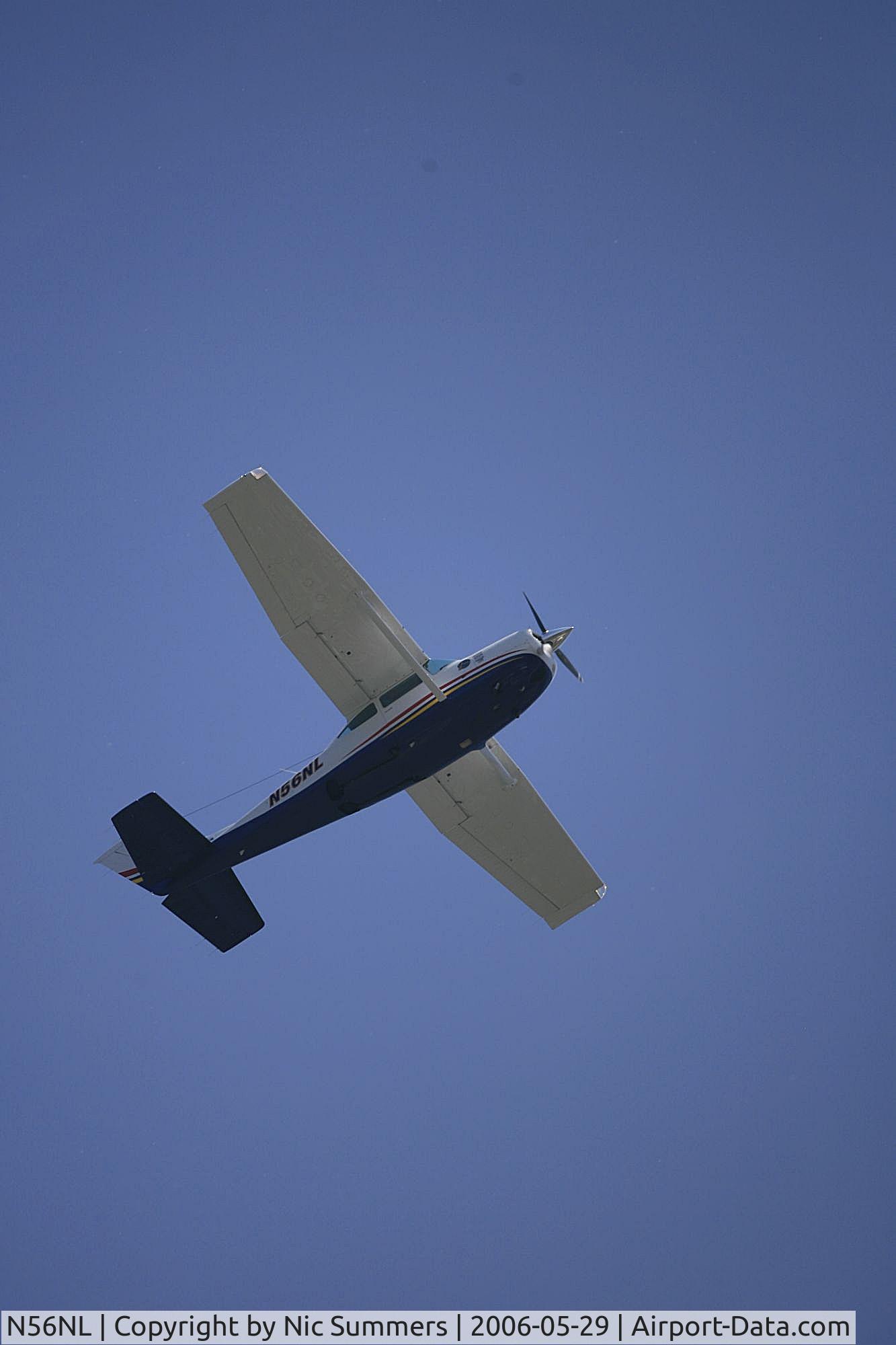 N56NL, 1977 Cessna R182 Skylane RG C/N R18200084, Heading east over Chicago Loyola University during a soccer game.