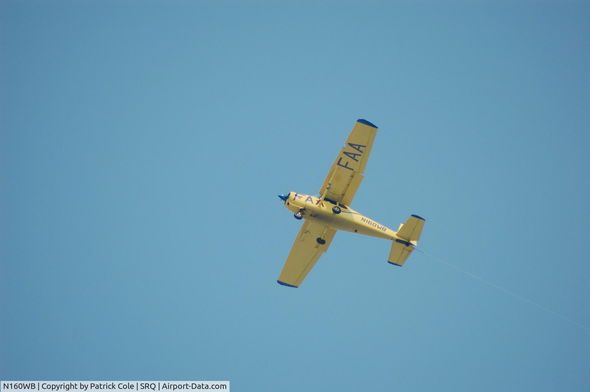 N160WB, 1958 Cessna 175 Skylark C/N 55238, Banner towing over Siesta Beach Sarasota Fl