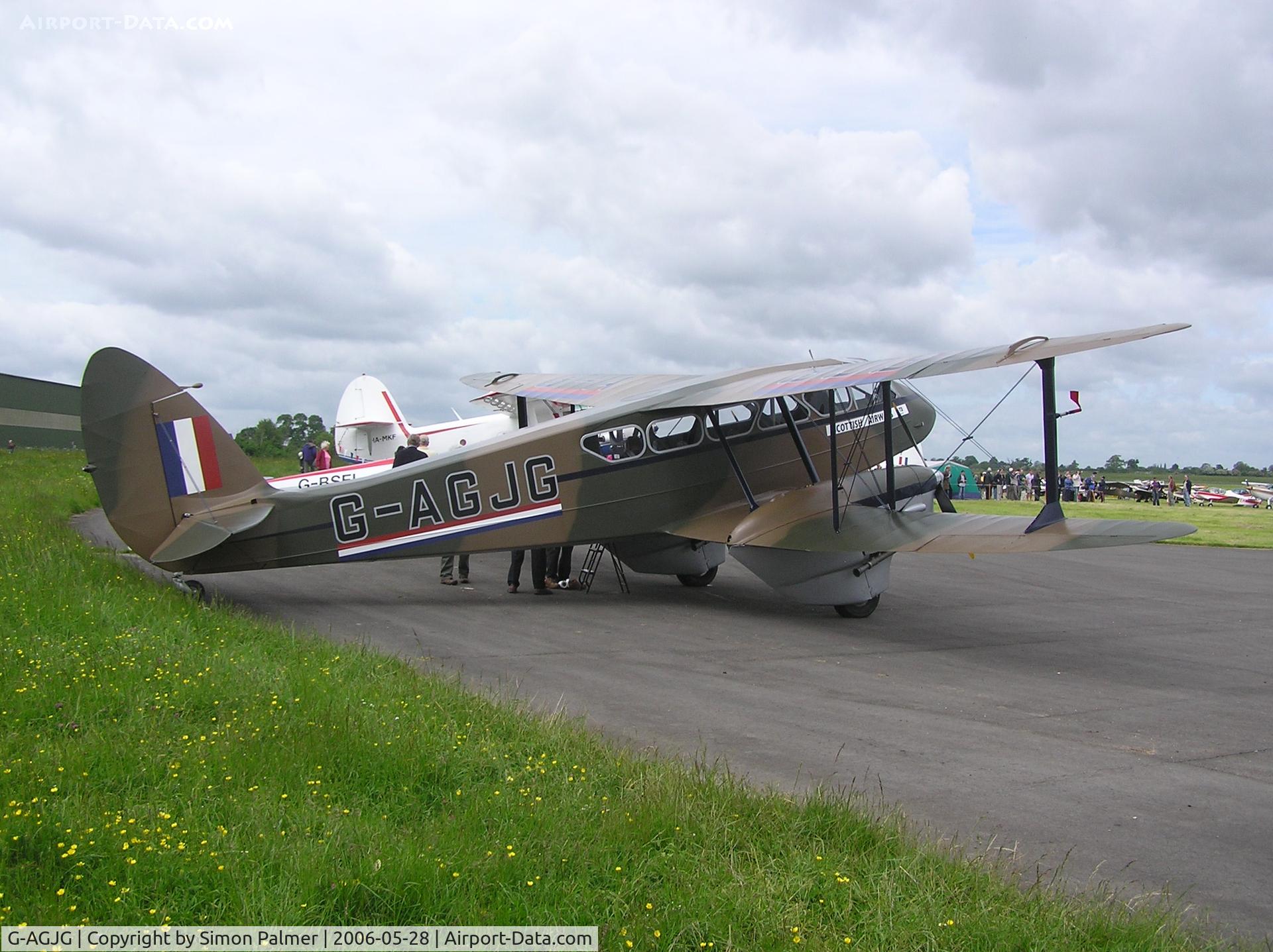 G-AGJG, 1941 De Havilland DH-89A Dominie/Dragon Rapide C/N 6517, DH89 Dragon Rapide in wartime colours at Keevil