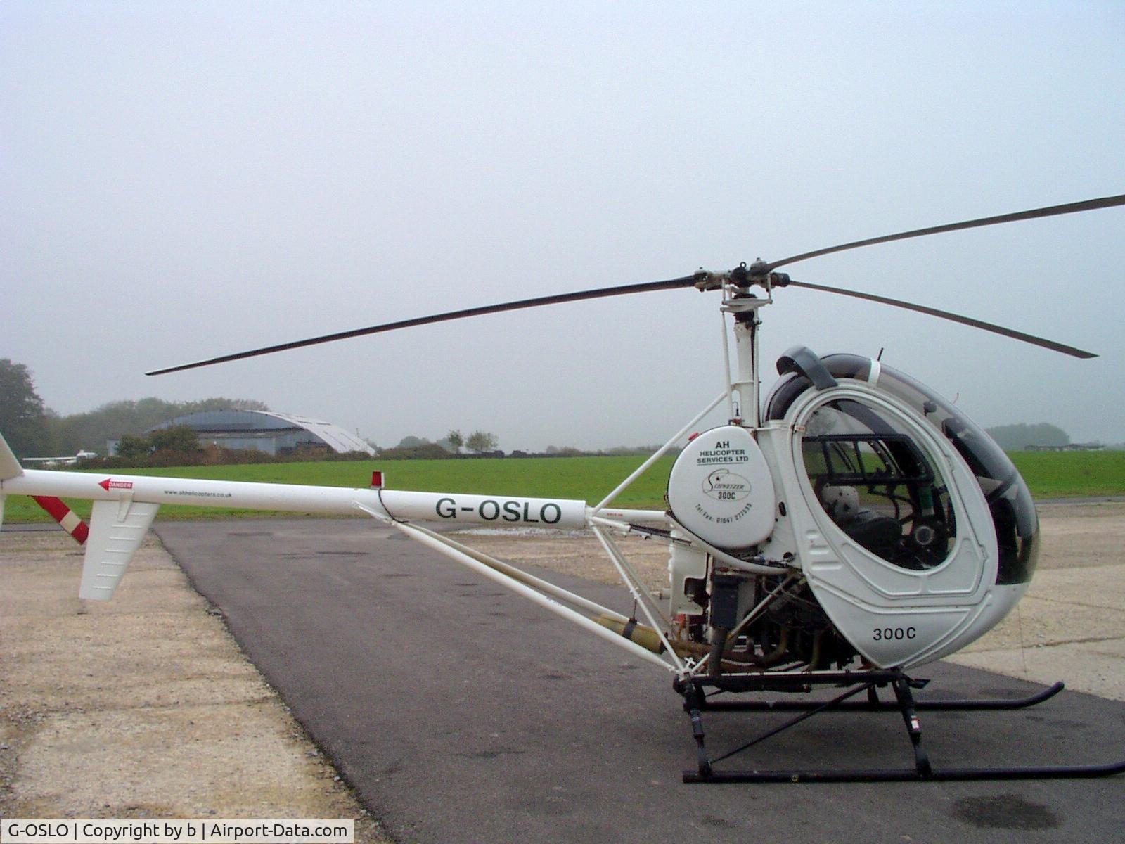 G-OSLO, 1989 Schweizer 269C C/N S 1360, parked