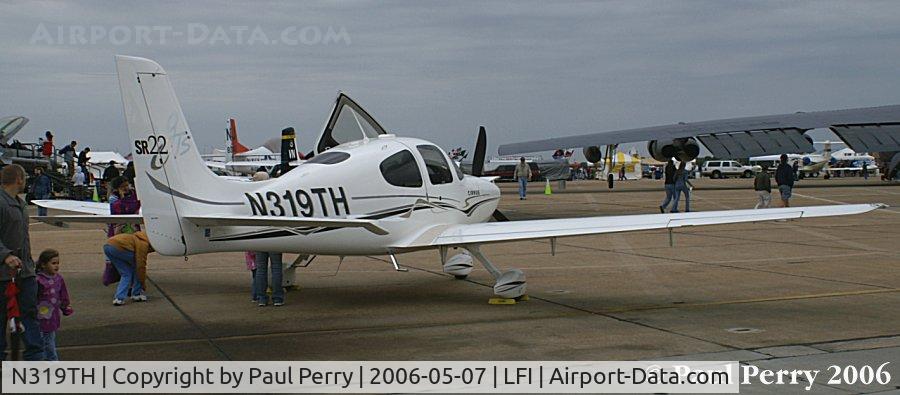 N319TH, 2004 Cirrus SR22 C/N 1231, Easy to see this SR-22 against the darkening skies