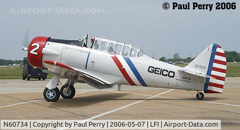 N60734, 1940 North American SNJ-2 Texan C/N 2032, The Not-so-Terrible Two, taxiing with the rest