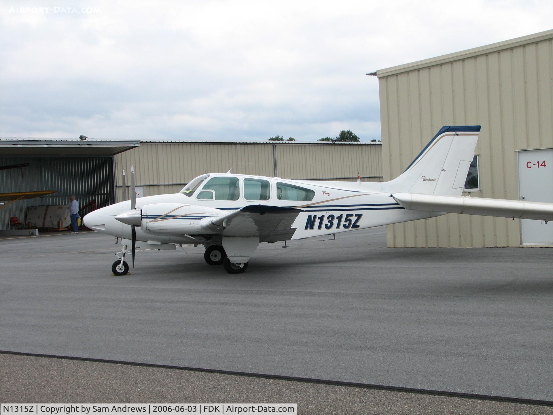 N1315Z, 1961 Beech 95-55 C/N TC-123, Parked behind the Hangars at the 2006 AOPA Fly-in.  Flew from Dayton Wright Brothers Airport (Dayton, OH) [KMGY/MGY].
