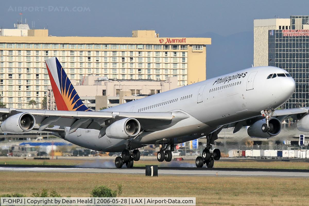 F-OHPJ, 1997 Airbus A340-313X C/N 173, Phillipines F-OHPJ touching down on RWY 24R.