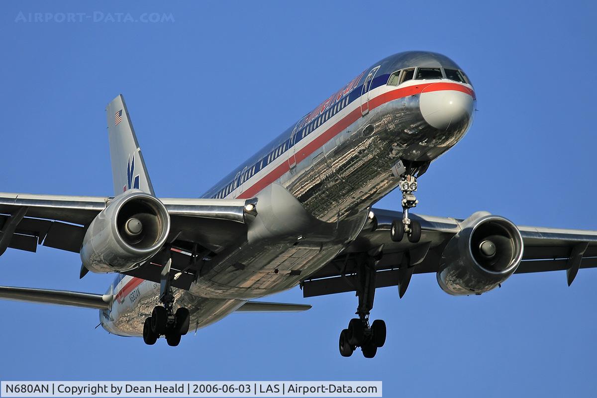 N680AN, 1999 Boeing 757-223 C/N 29590, American Airlines N680AN (FLT AAL966) from Miami Int'l (KMIA) on final approach to RWY 25L.  The reflections from the fuselage are distracting, yet show the conditions at the moment the photo was captured.