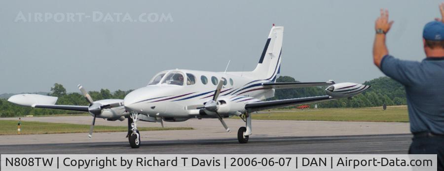 N808TW, 1977 Cessna 340A C/N 340A0304, Guy guides 1977 Cessna 340A in front of General Aviation in Danville Va.