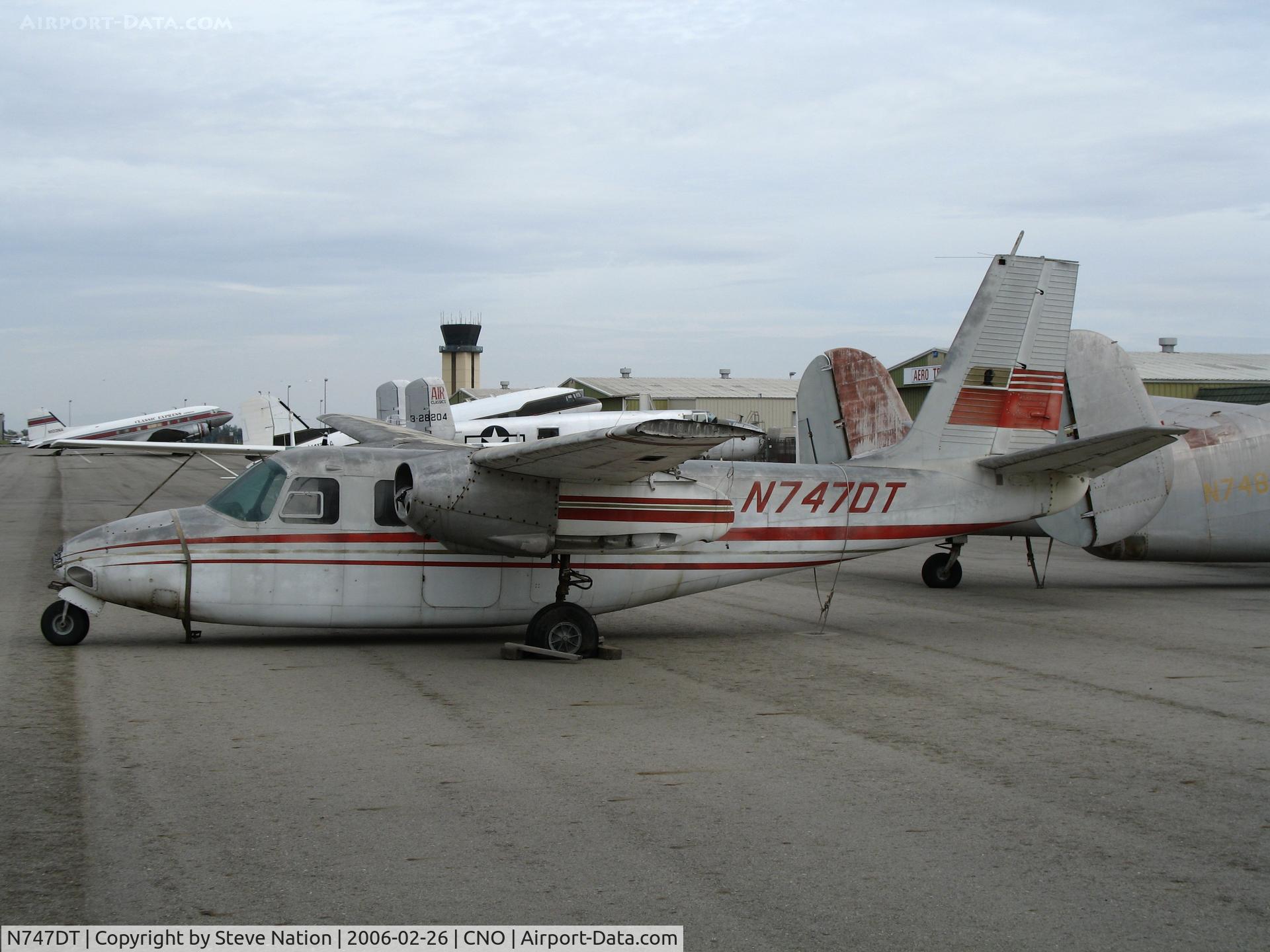 N747DT, 1954 Aero Commander 560 C/N 168, Butterfield Airplane Stores' 1954 Aero Commander 560 has seen better days (s/n 168 has been cancelled) @ Chino Municipal Airport, CA