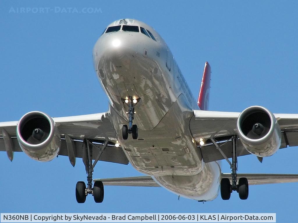 N360NB, 2003 Airbus A319-114 C/N 1959, Northwest Airlines / 2003 Airbus A319-114 / Sporting 'Sergeant' Stripes above cockpit. };>)