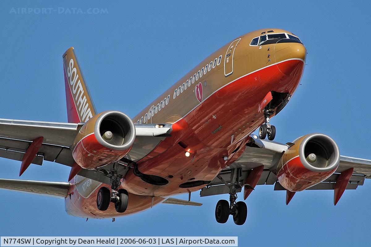N774SW, 2000 Boeing 737-7H4 C/N 27882, Southwest Airlines N774SW in brilliant evening light, on final approach to RWY 25L.