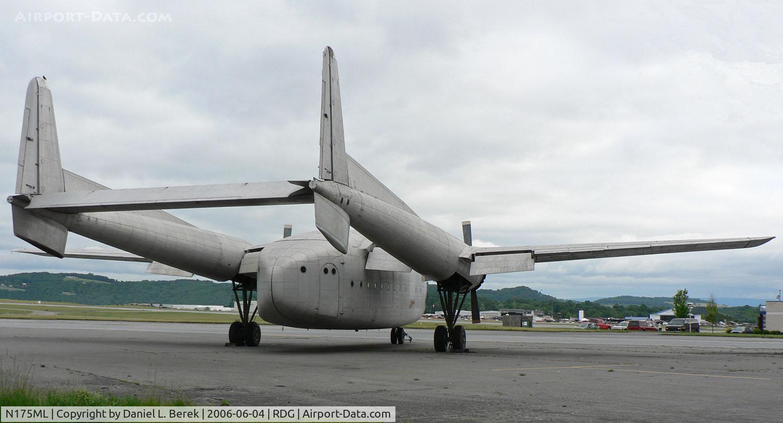 N175ML, 1953 Fairchild C-119F Flying Boxcar C/N 10844, The silver skin of this C-119 blends in with a brooding spring sky.