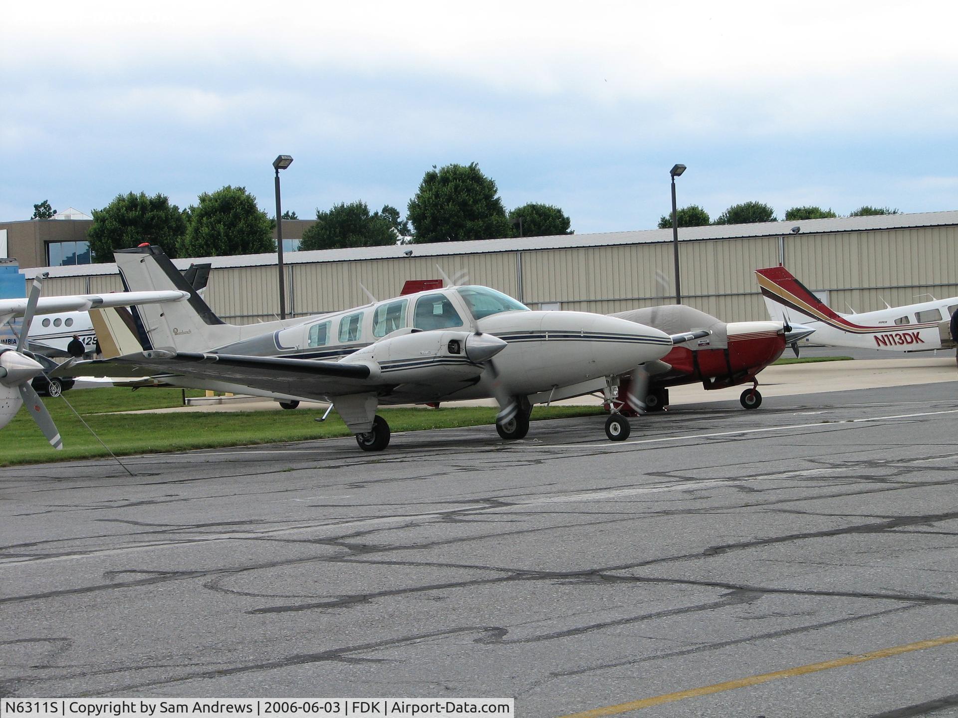 N6311S, 1977 Beech 58 Baron C/N TH-782, This was right after start up.  I heard him say he ws flying to Tulsa, OK.
