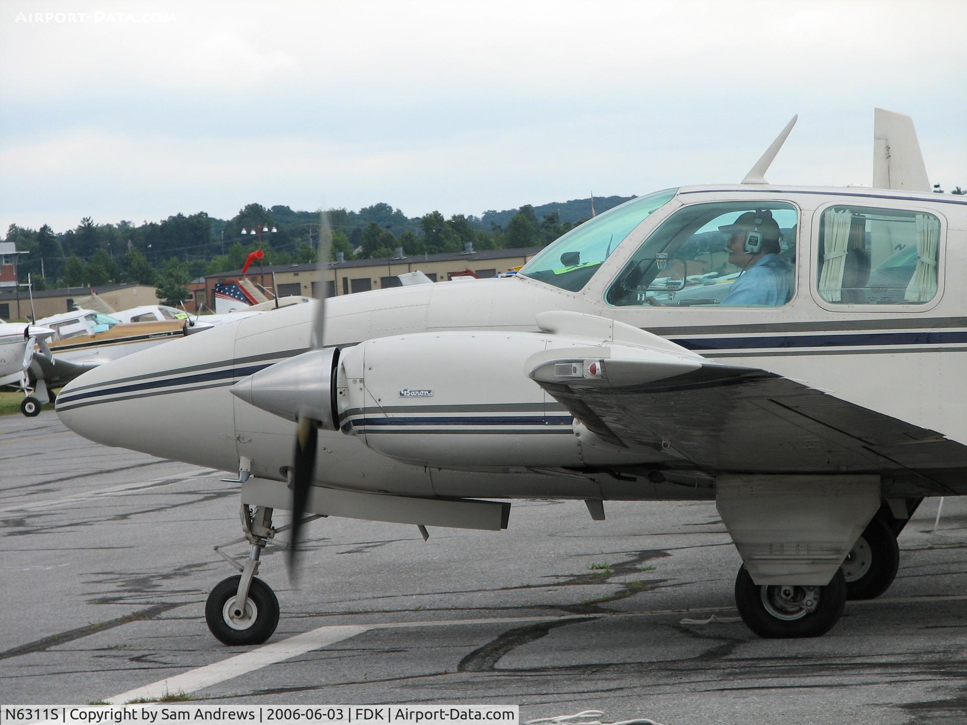 N6311S, 1977 Beech 58 Baron C/N TH-782, Awaiting clearance to Clark Co Airport (Jeffersonville, IN) [KJVY/JVY] on his way to Tulsa, OK from the 2006 AOPA Fly-In.