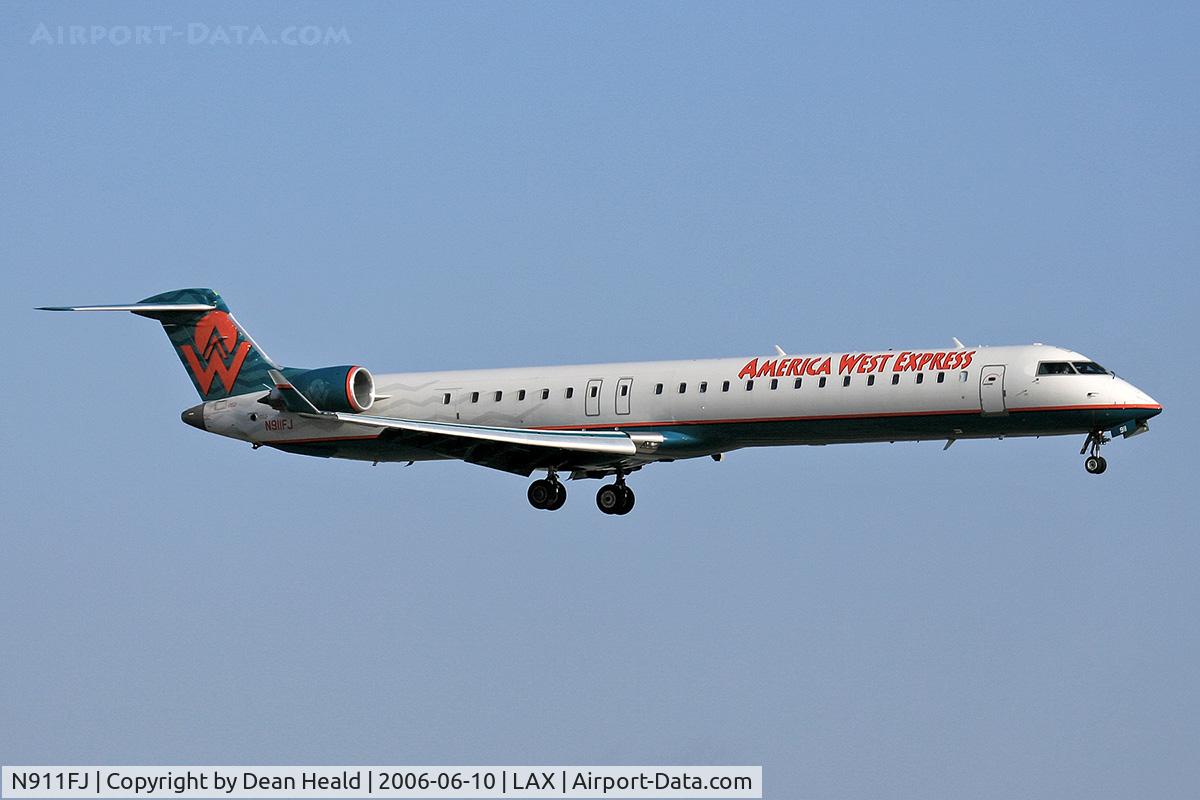N911FJ, 2003 Bombardier CRJ-900ER (CL-600-2D24) C/N 15011, America West Express (Mesa Airlines) N911FJ (FLT ASH6007) from Licenciado Gustavo Diaz Ordaz Int'l (MMPR) on short-final to RWY 24R.