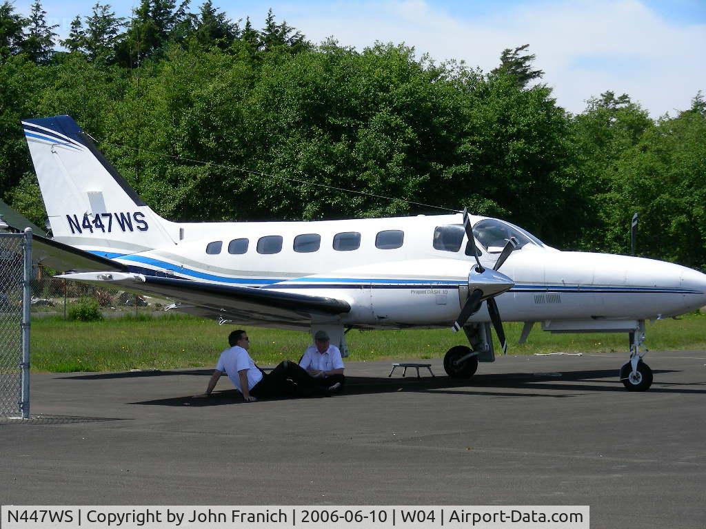 N447WS, Cessna 441 C/N 441-0198, At w04 waiting for passengers, you should have seen the short feild landing and the back in parking, these guys are good.