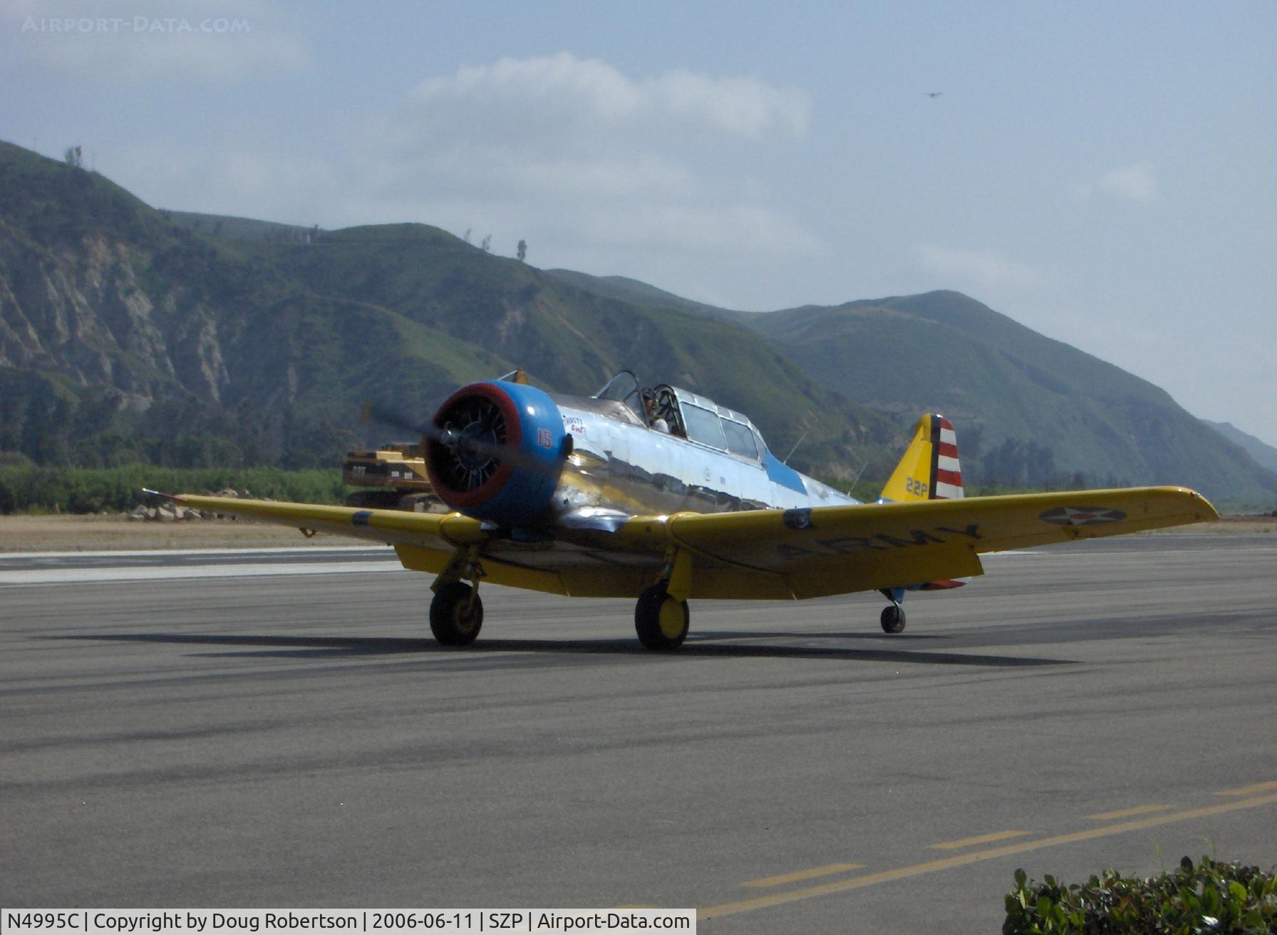 N4995C, 1949 North American T-6G Texan C/N 168-481, North American T-6G TEXAN (1949 factory reman) 'Thirsty Girl' taxi after flaps landing Runway 22