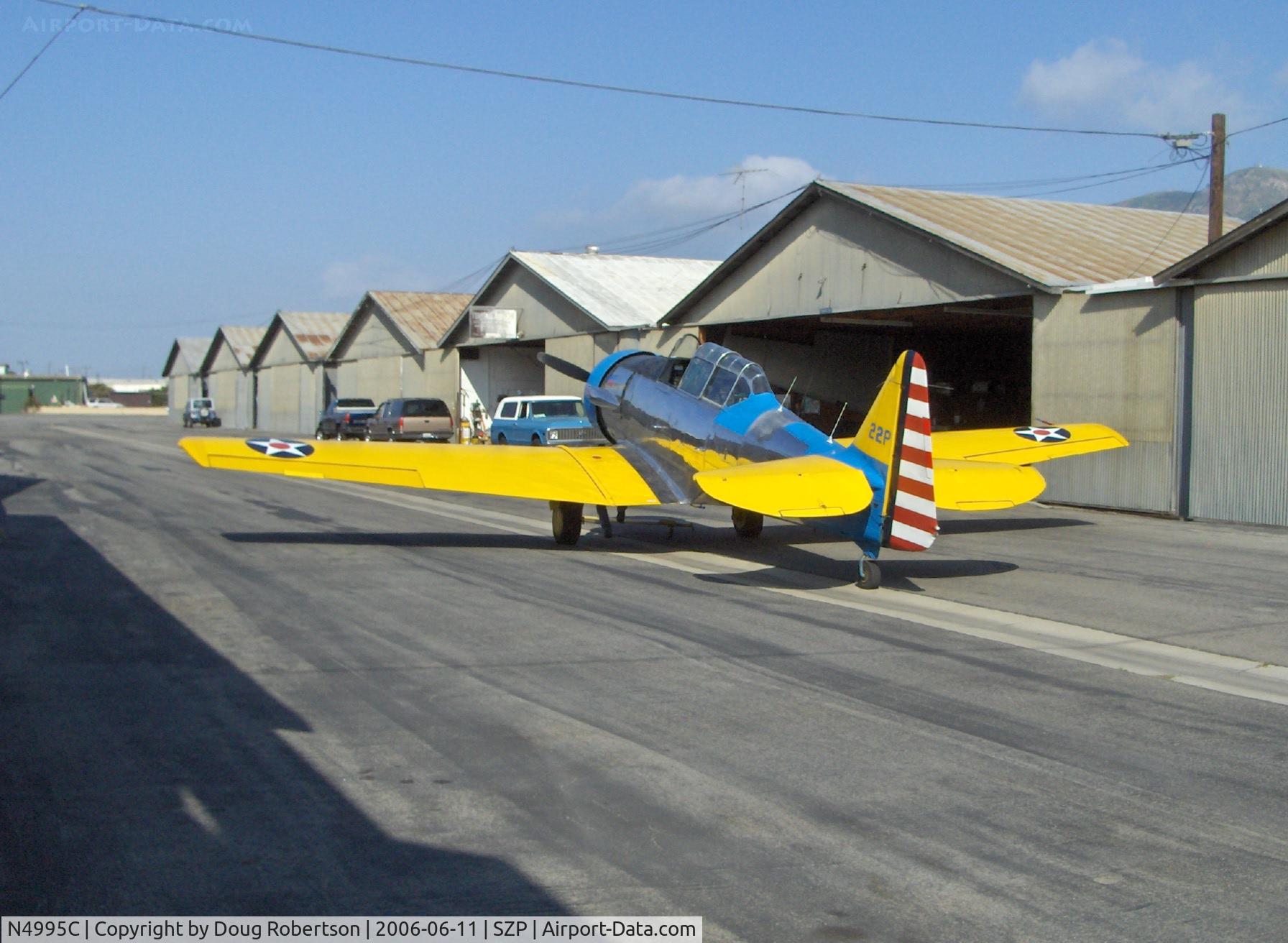 N4995C, 1949 North American T-6G Texan C/N 168-481, North American T-6G TEXAN 'Thirsty Girl' at her hangar apron