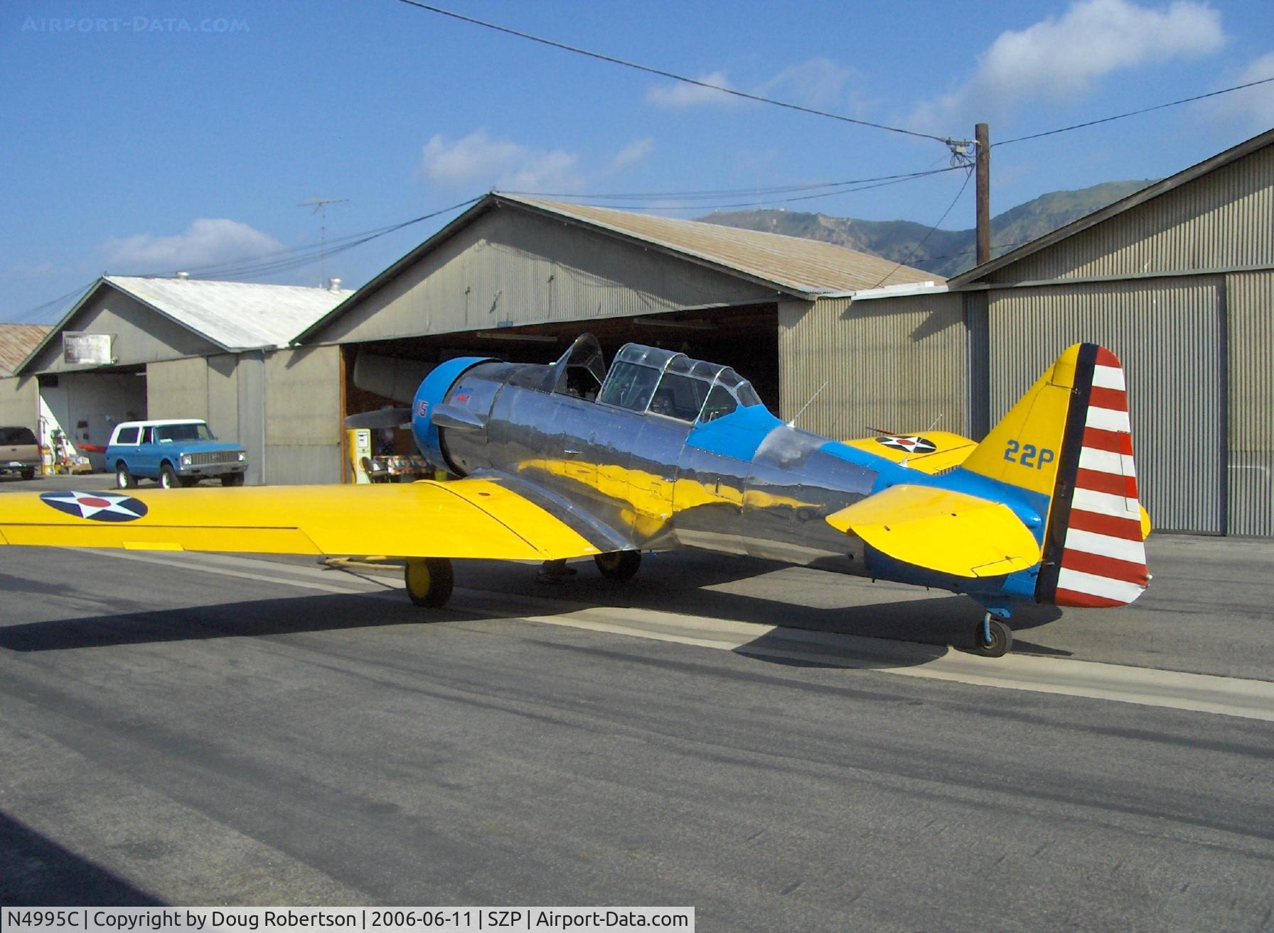 N4995C, 1949 North American T-6G Texan C/N 168-481, North American T-6G TEXAN 'Thirsty Girl' at her hangar apron