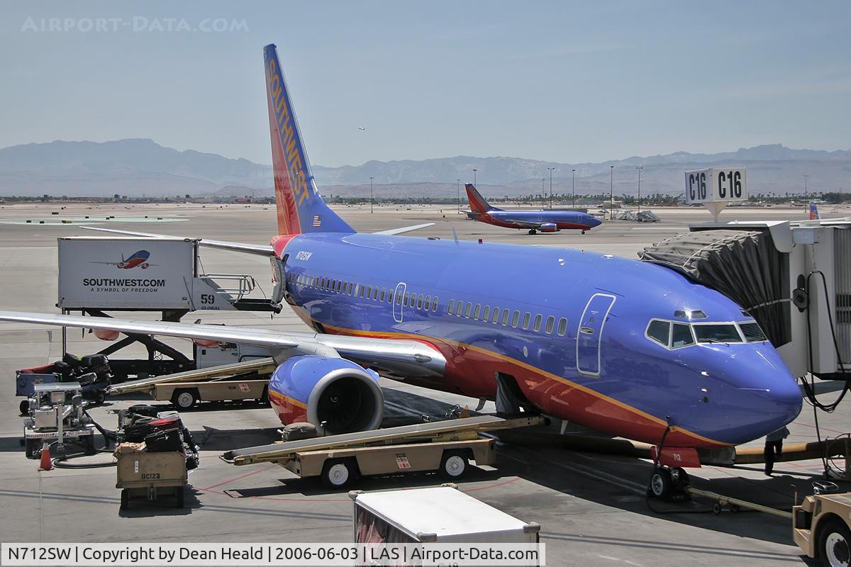 N712SW, 1998 Boeing 737-7H4 C/N 27846, Southwest Airlines N712SW at Gate C16 as viewed from inside the terminal.
