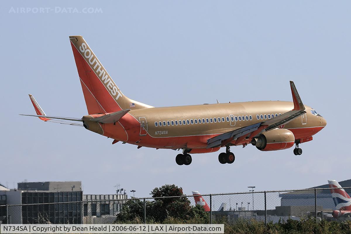 N734SA, 1999 Boeing 737-7H4 C/N 27866, Southwest Airlines N734SA (FLT SWA1047) from Nashville Int'l (KBNA) seconds from touchdown on RWY 24R.
