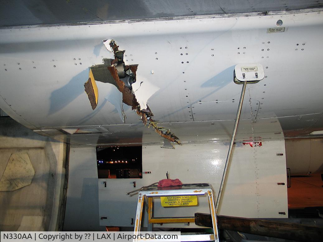 N330AA, 1987 Boeing 767-223 C/N 22330, #1 Shells & Takes out #2