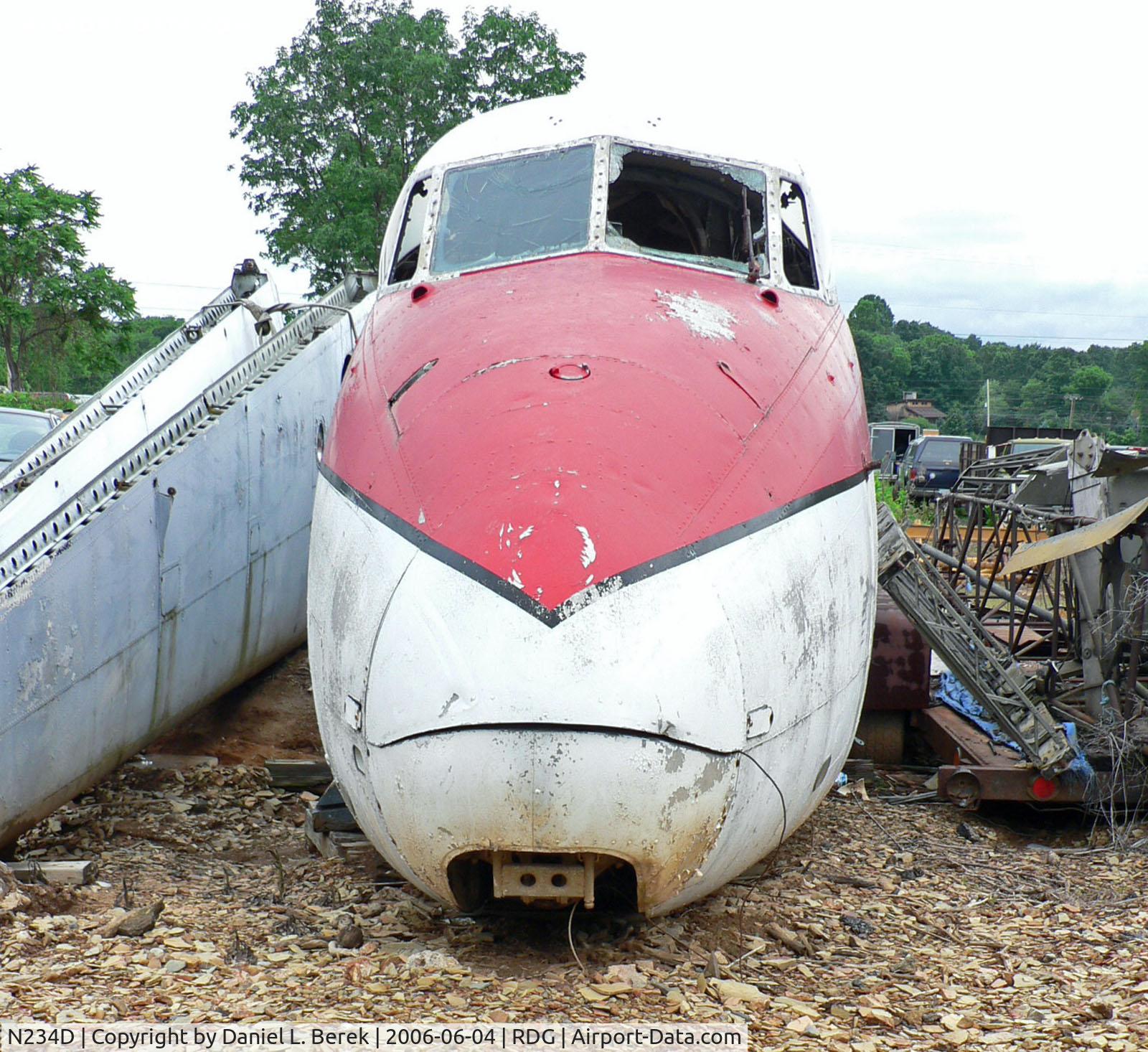 N234D, 1959 De Havilland DH-104 Dove 6A C/N 04387, A sad, broken DH-104 Dove stares into oblivion amid assorted aeroneutical detritus.
