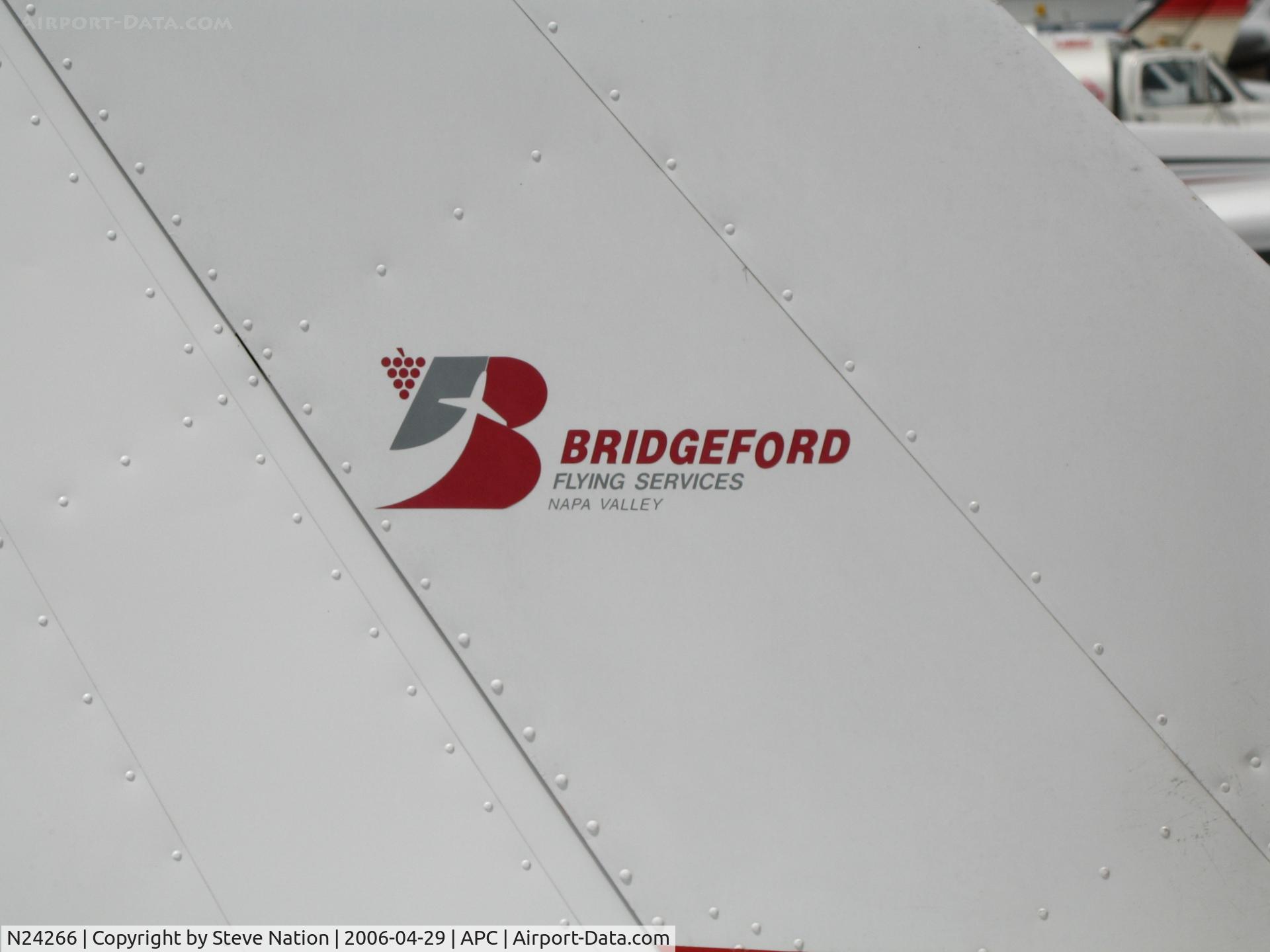 N24266, 1977 Cessna 152 C/N 15280185, Bridgeford Flying Service 1977 Cessna 152 with tail logo @ Napa County Airport, CA