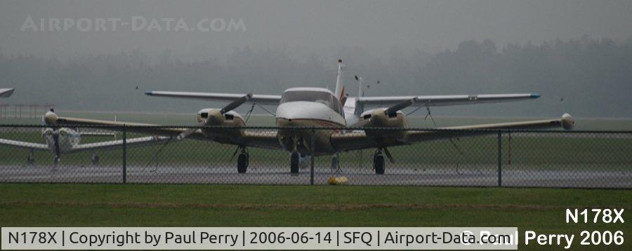 N178X, Piper PA-30 Twin Comanche Twin Comanche C/N 30-1950, Dark and rainy, early in the morning with a cargo bird, perhaps?