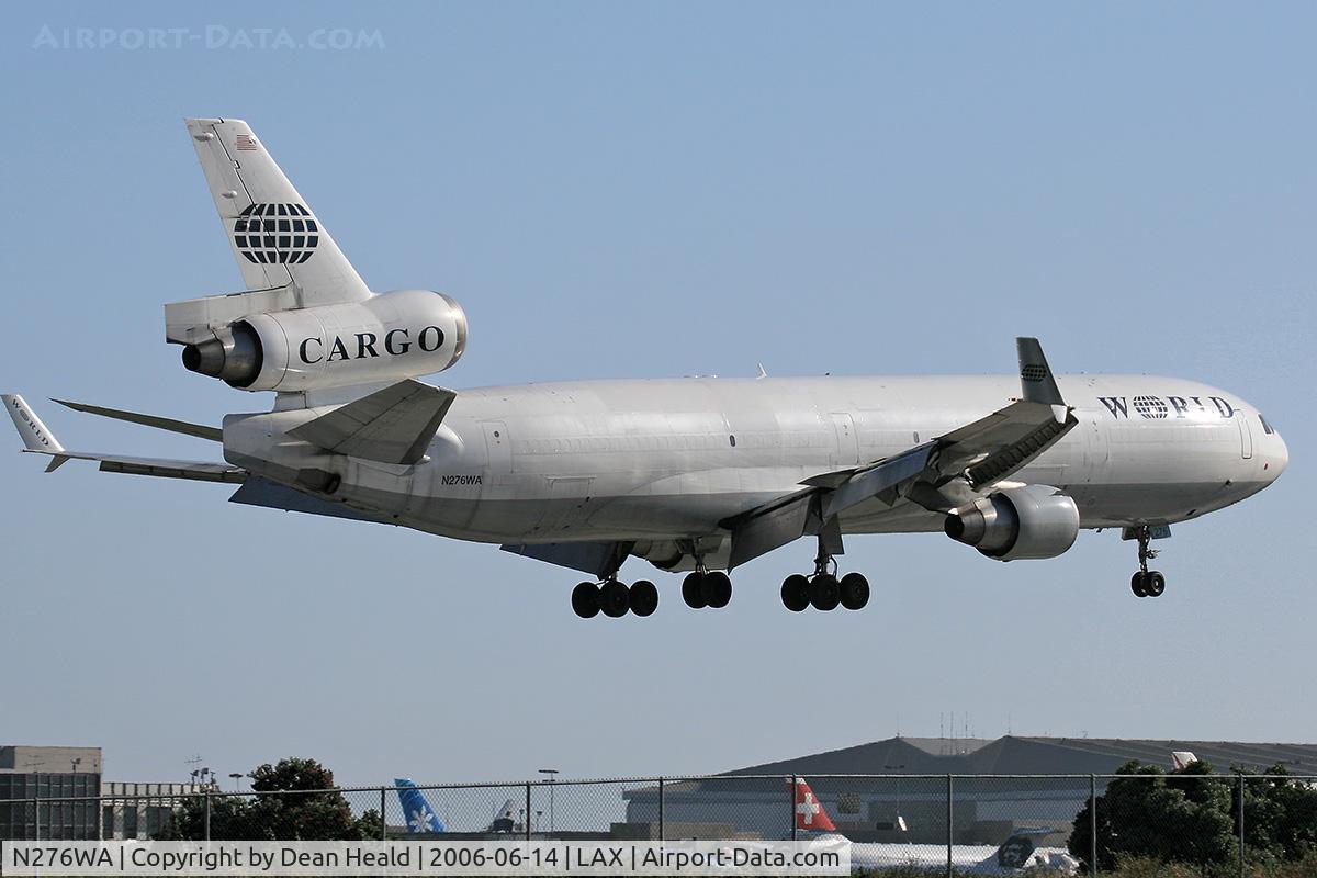 N276WA, 1995 McDonnell Douglas MD-11F C/N 48632, World Airways Cargo N276WA seconds from touchdown on RWY 24R.