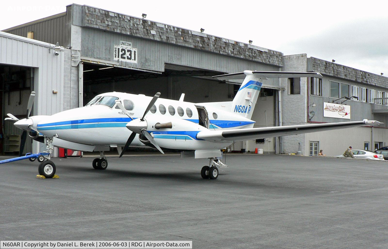 N60AR, 2000 Raytheon Aircraft Company B200 C/N BB-1743, Beech B200 gleams at Reading, PA.