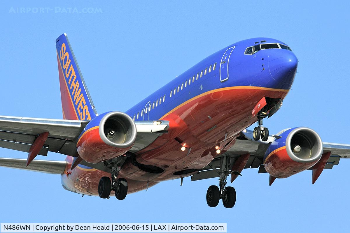 N486WN, 2004 Boeing 737-7H4 C/N 33852, Southwest Airlines N486WN (FLT SWA988) from Metropolitan Oakland Int'l (KOAK) on final approach to RWY 24R.