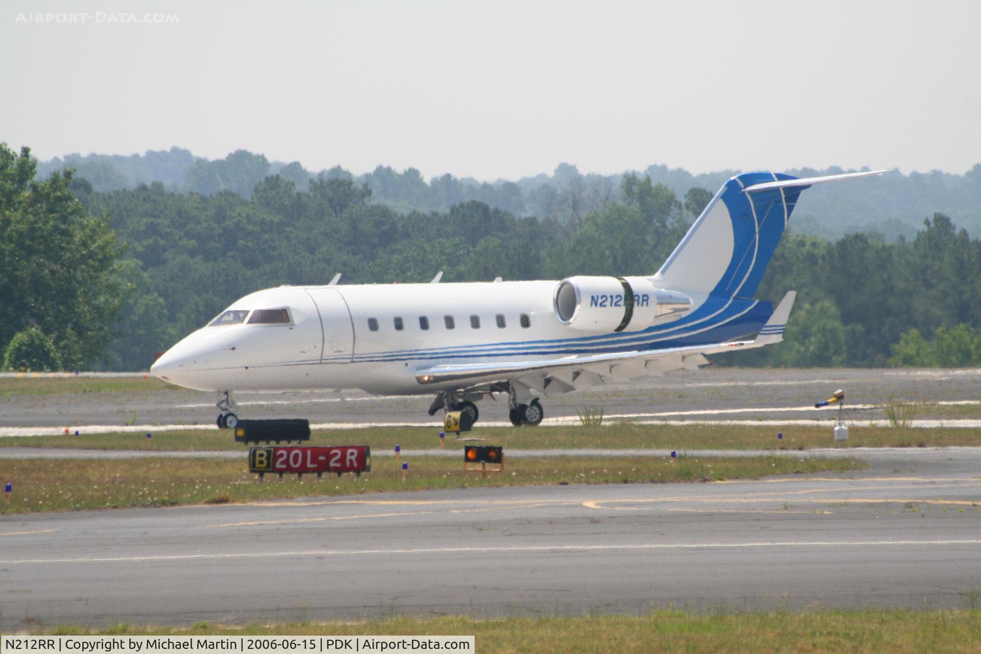 N212RR, 1997 Canadair Challenger 604 (CL-600-2B16) C/N 5336, Landing Runway 20R