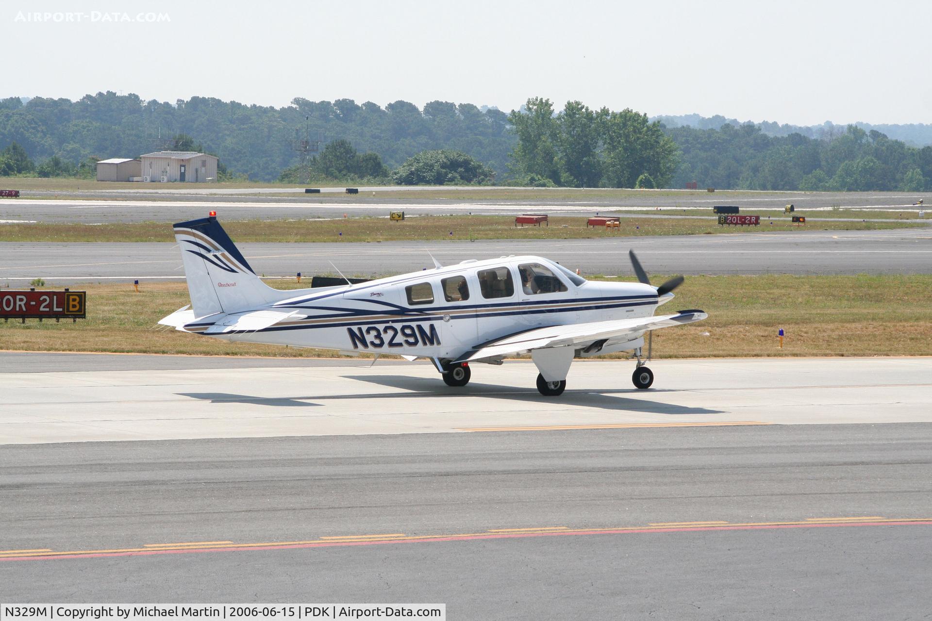 N329M, Raytheon Aircraft Company A36 Bonanza C/N E-3490, Taxing to Runway 20L