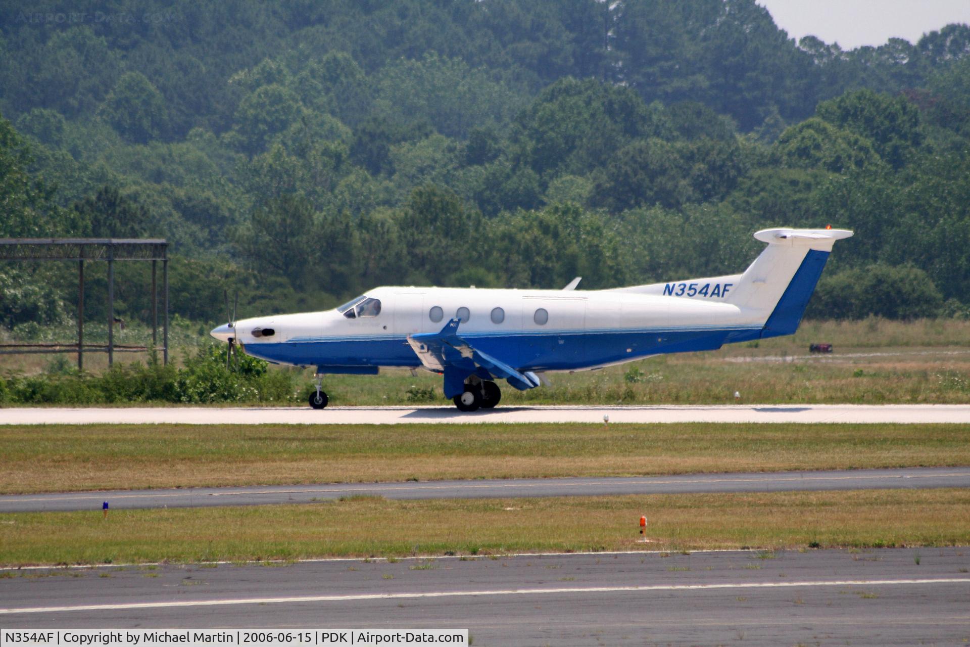 N354AF, 2000 Pilatus PC-12/45 C/N 354, Landing Runway 20R