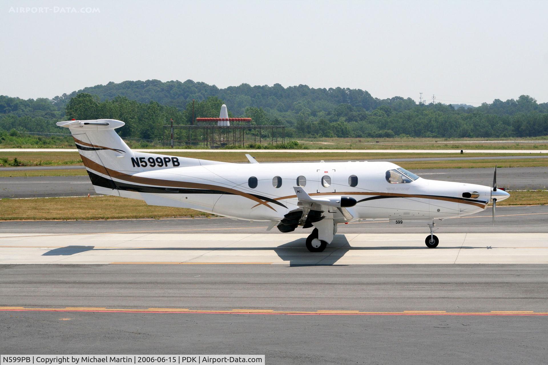 N599PB, 2004 Pilatus PC-12/45 C/N 599, Taxing to Runway 20R