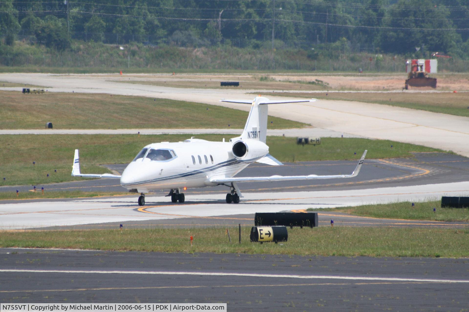 N755VT, 1990 Gates Learjet 55C C/N 142, Taxing to Epps Air Service