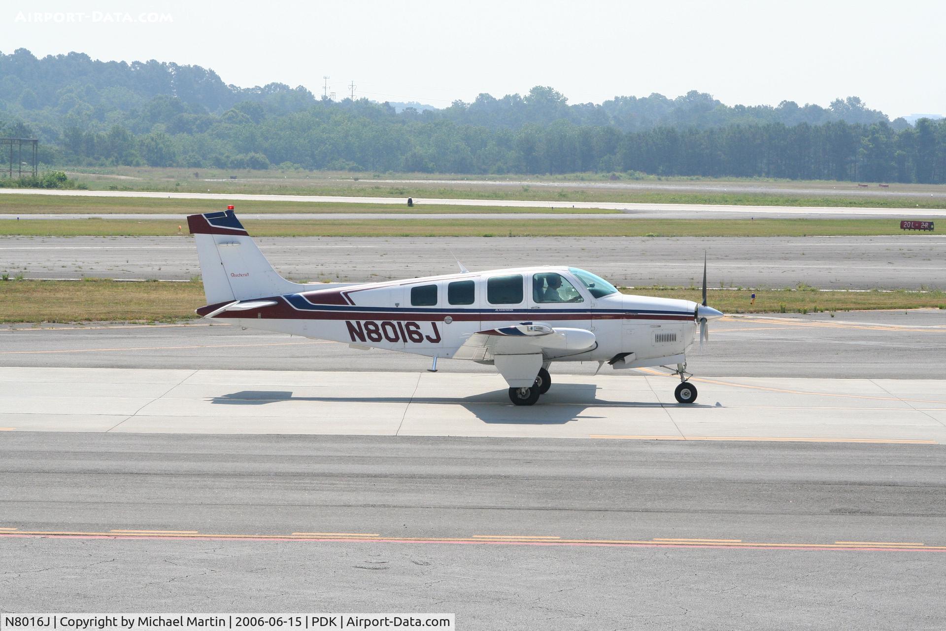 N8016J, 1990 Beech A36 Bonanza 36 C/N E-2562, Taxing to Runway 20L