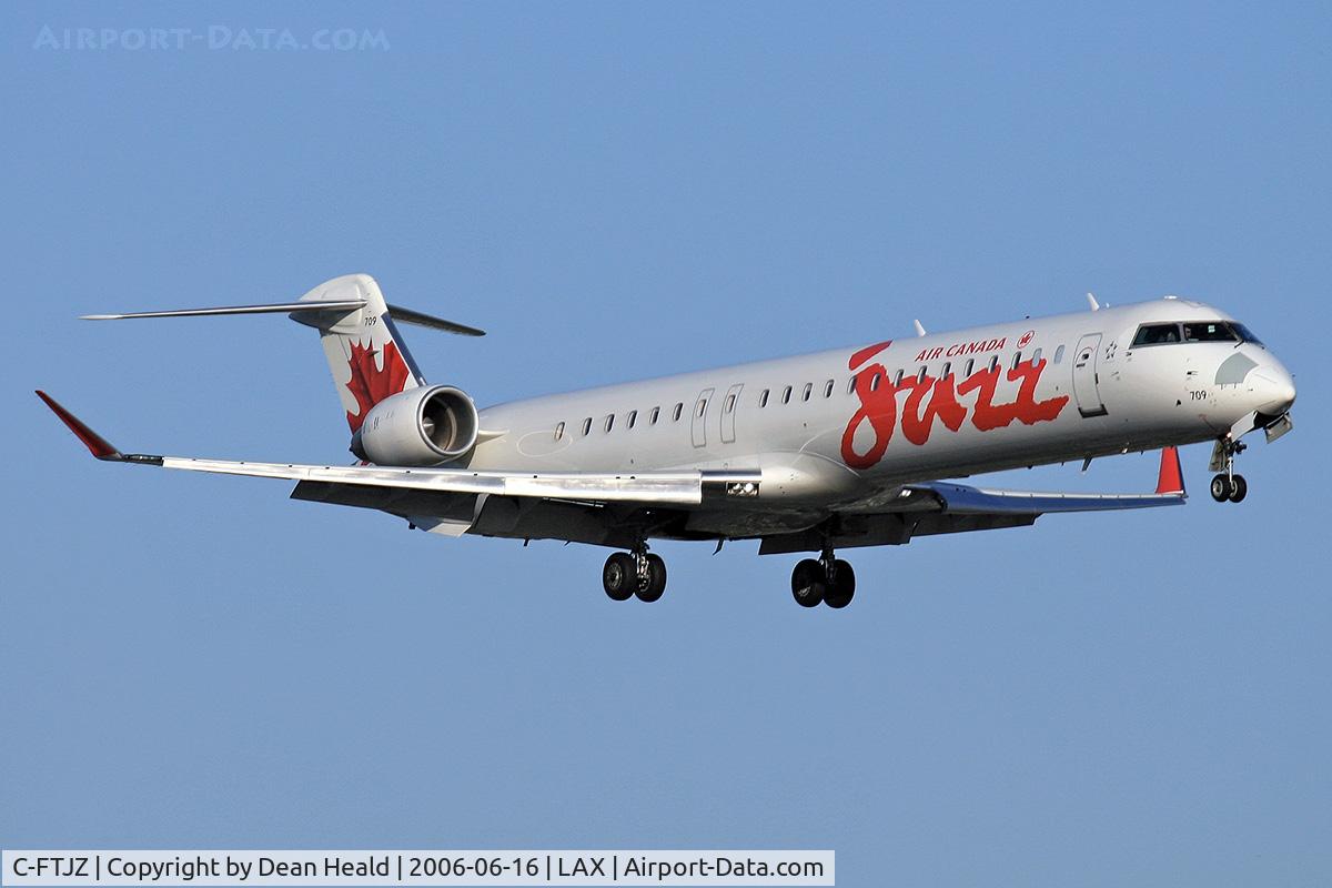 C-FTJZ, 2005 Canadair CRJ-705ER (CL-600-2D15) Regional Jet C/N 15047, Air Canada Jazz C-FTJZ (FLT JZA8529) from Edmonton Int'l (CYEG) on final approach to RWY 24R.