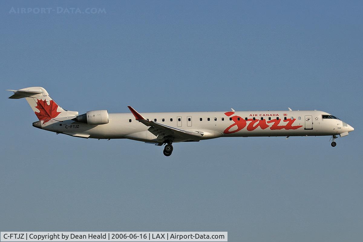 C-FTJZ, 2005 Canadair CRJ-705ER (CL-600-2D15) Regional Jet C/N 15047, Air Canada Jazz C-FTJZ (FLT JZA8529) from Edmonton Int'l (CYEG) on final approach to RWY 24R.