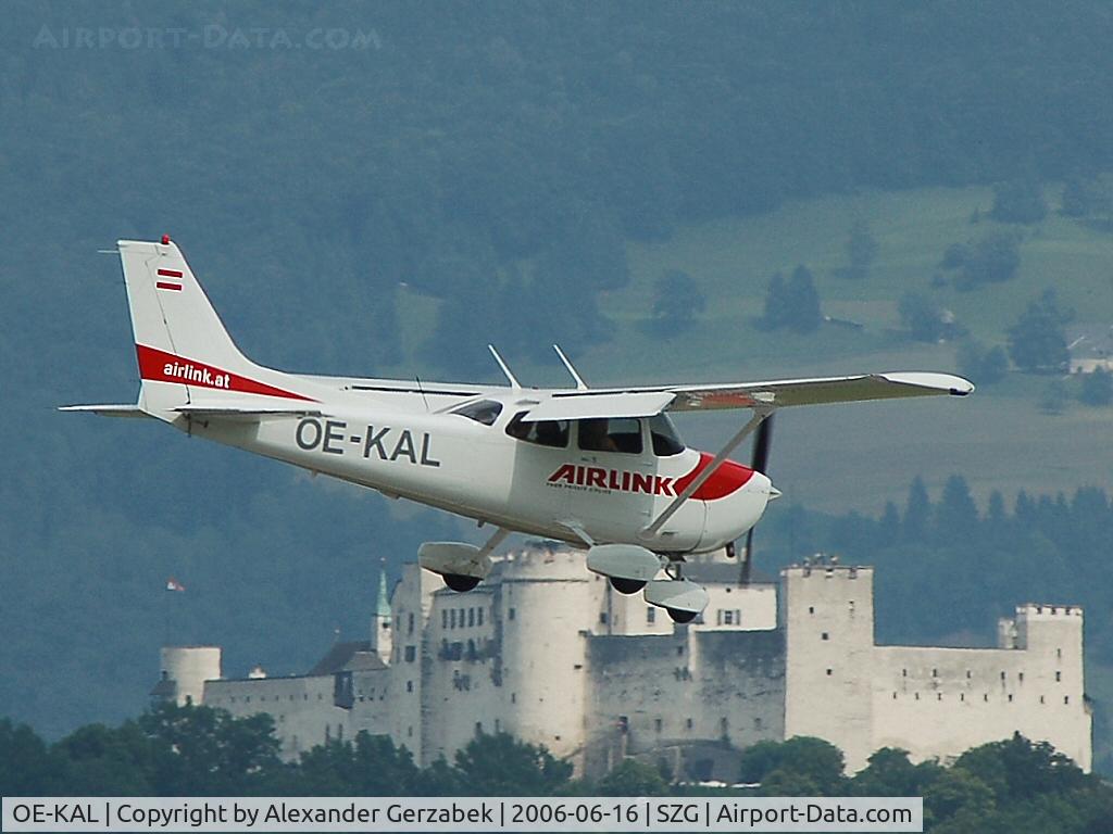 OE-KAL, 2005 Cessna 172S C/N 172S-9784, Passing by in front of the famous tower of Salzburg on final approach to Rwy 16