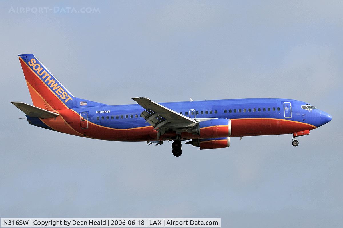 N316SW, 1986 Boeing 737-3H4 C/N 23338, Southwest Airlines N316SW (FLT SWA756) from Norman Y Mineta San Jose Int'l (KSJC) on final approach to RWY 24R.