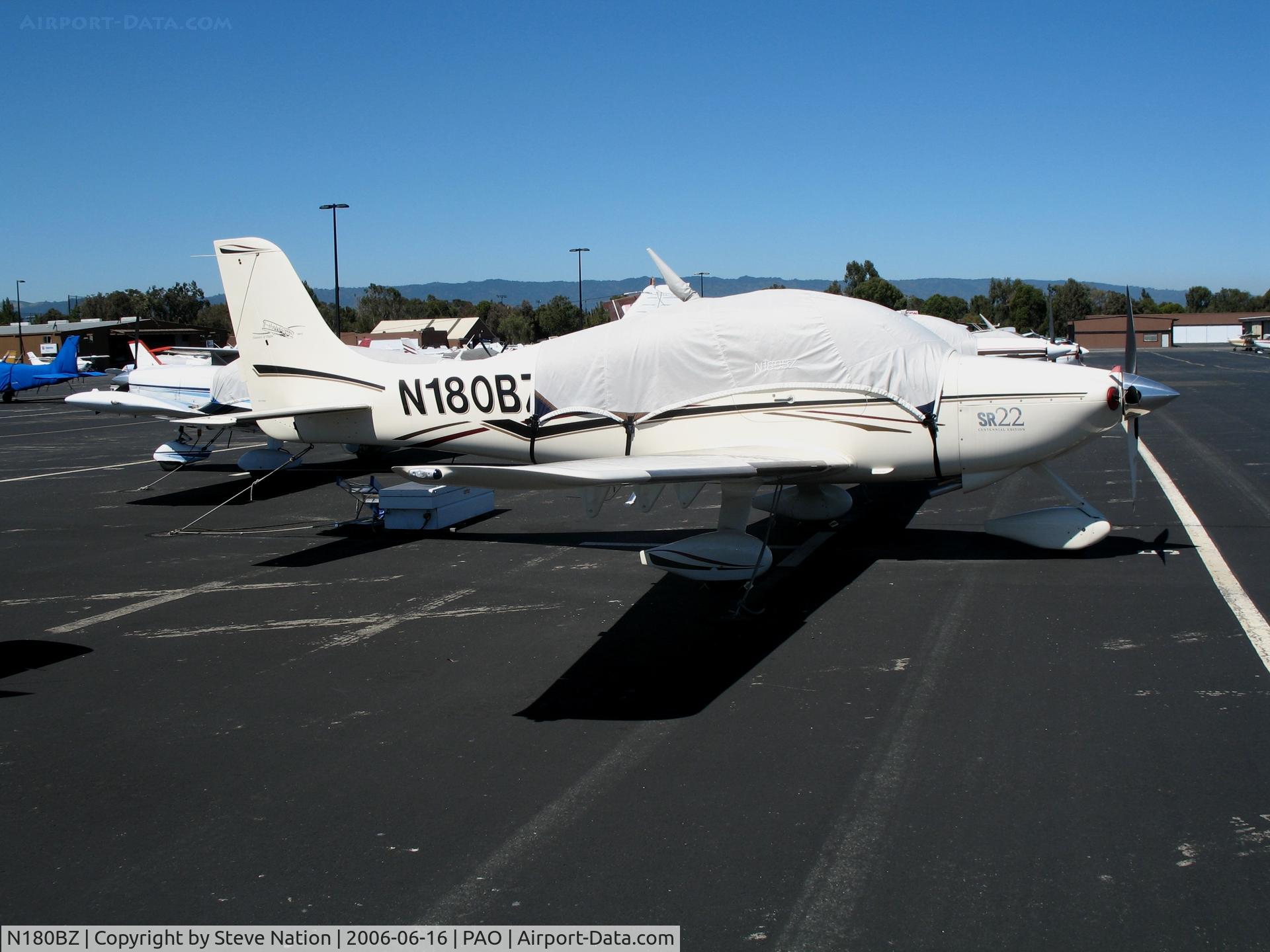 N180BZ, 2003 Cirrus SR22 C/N 0714, Bravo Zulu Ventures 2003 Cirrus Design SR22 with 'Century of Flight' tail logo and cockpit cover @ Palo Alto Airport, CA