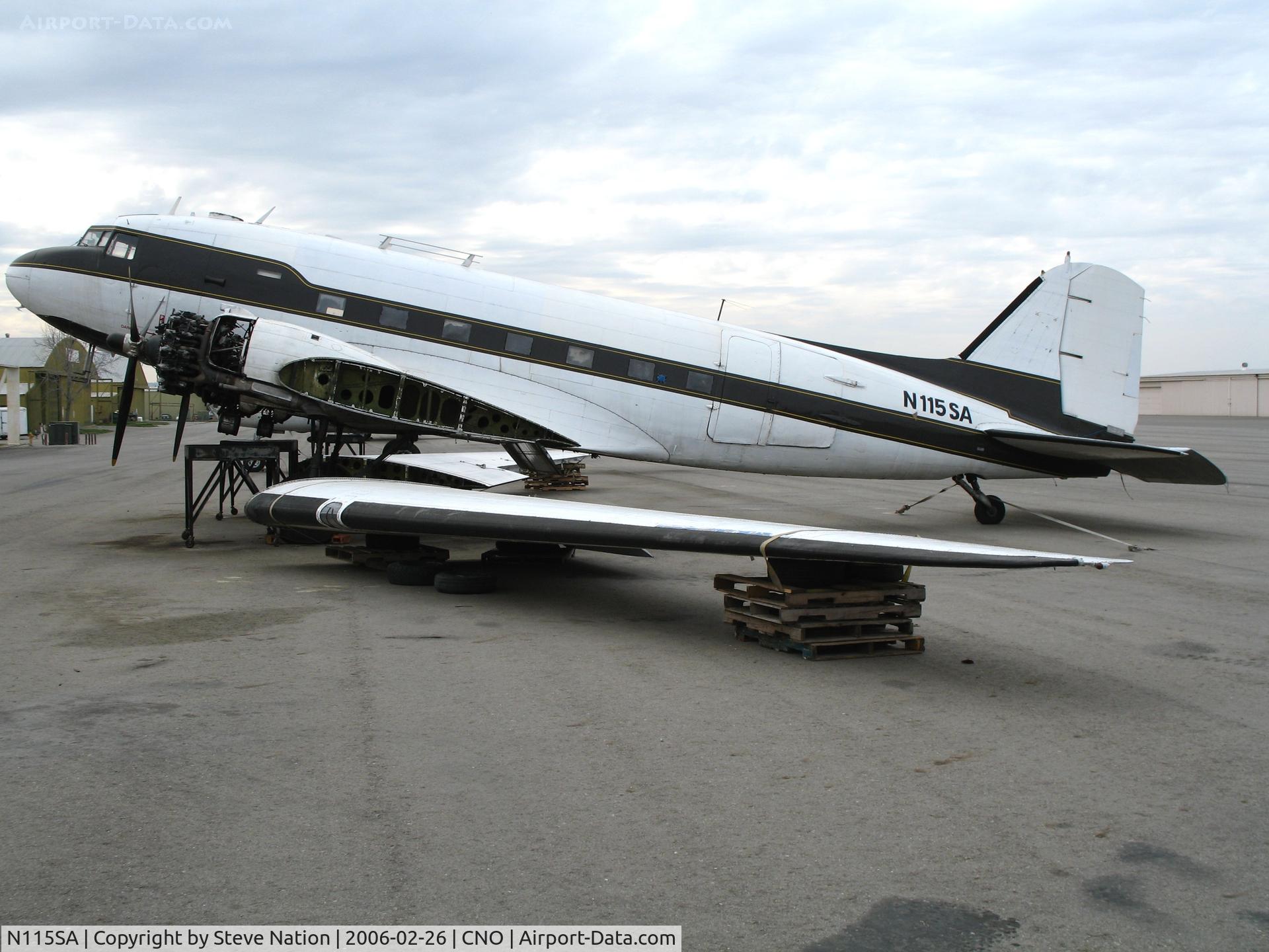 N115SA, 1944 Douglas DC3C-S1C3G (C-47A) C/N 13310, First Flight Inc. Douglas DC-3C with wings unbolted @ Chino Municipal Airport, CA