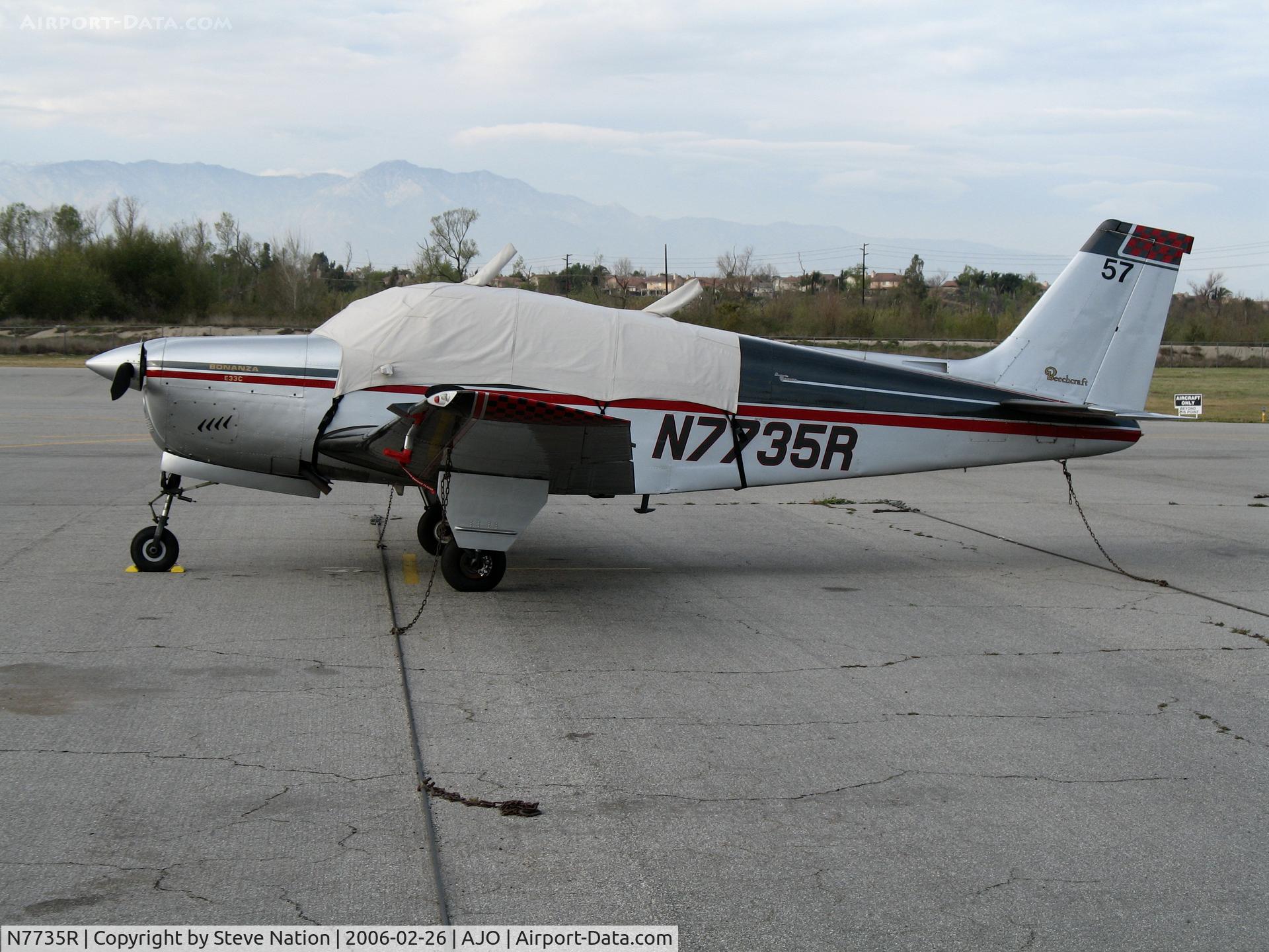 N7735R, 1968 Beech E33C Bonanza C/N CJ-8, 1968 Beech E33C Bonanza tail # 57 with cockpit cover @ Corona Municipal Airport, CA