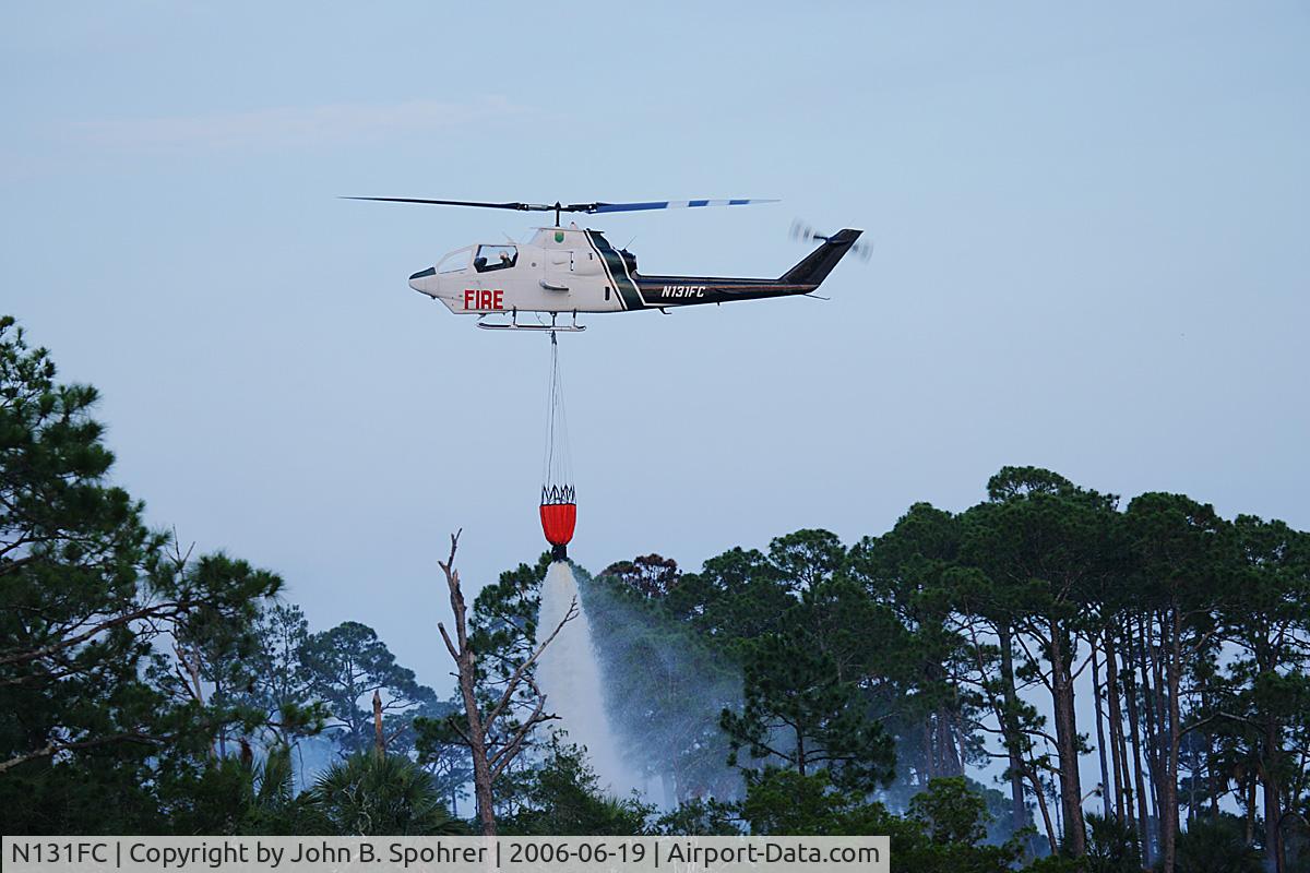 N131FC, Bell AH-1F Cobra C/N 76-22570, AH-1F Cobra on firefighting run near Eastpoint, FL