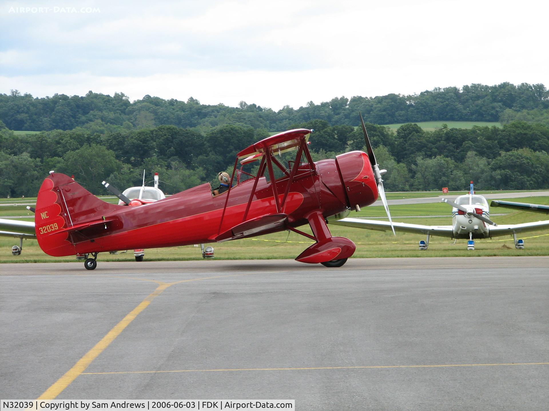 N32039, 1941 Waco UPF-7 C/N 5670, Just arrived and taxiing to its place of honor at the 2006 AOPA Fly-In.